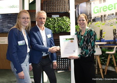 Martine Holtkamp awards the RHP certificate. Green Product is the first company to be certified for module plugs
