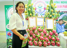 Hung Thinh Phat Clean Agricultural Cooperative grows dragon fruit, pomelo, water melon. On the photo is Lana.