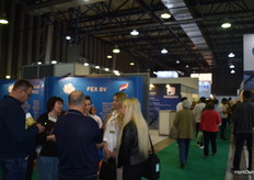 At the Gunsa Makine booth they’re all looking at the promotional video, of their machines, like the soil mixer and potting machines.