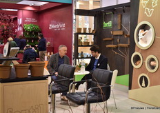 Julien Perreve-Genet of Fertil talking with a visitor.