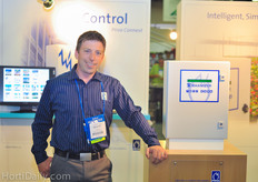 Dave Taylor from Priva North America standing next to the Maximizer that is completely developed in North America.