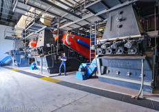 "Six Vyncke biomass boilers are supplying the greenhouse complex with enough heat to warm the greenhouses. In the wintertime, 16 truckloads with wood are burned everyday. The boilers reach a temperature of 120 degrees Celsius and have a total capacity of 177 million BTU. By heating the greenhouse with biomass boilers, Green Circle Growers annually save 60.000 tons of CO2. The reason for GCG to use biomass instead of natural gas is the high oil price of the last years, which makes it more attractive. "The price of the wood chips simply is more stable, the transport of the wood chips is the biggest cost."