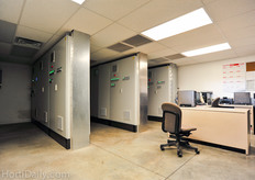 This is the control room of the Vyncke boiler system. The boilers are burning day and night, also during the warmer summer time, because the orchid production requires a constant temperature . Even in the summer time, they are kept on 28 degrees Celsius and a radiation pipe of 40 degrees Celsius is needed in the greenhouse.