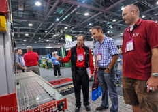 AgriNomix' Rob Lando showing the new RW64 transplanter; this machine can transplant 55,000 plants per hour thanks to it's 64 grippers, fast but smooth running. The machine is mainly designed for the US Market.