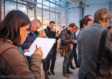 Li Liu of Costa Farms Australia writing down as much as she can.