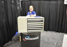 Jon V. Rector of Modine Manufacturing Company showing their Effinity heater.