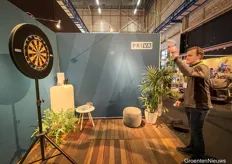 Darts at Priva. Cornald Aldhoff of Aldhoff Engineering throws in the bullseye.