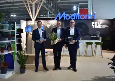 Davide Cavallini holding a Thomsen 100% recycled and recyclable pot, Tony Christensen holding Clampack, a new environmental packaging concept for online sales of plants, Jesper Rosgaard holding the New generation tray from Modiform, Pristine, 100% recycled PS tray without additives.