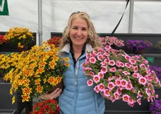 Lisa Heredia  of Danziger with Blazing Star™ Bidens and Lia™ Spark Pink Calibrachoa. Danziger is presenting their varieites at Headstart Nursery in Gilroy. 