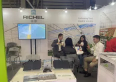 Laughter at the stand of Richel Group, a greenhouse design company from France.