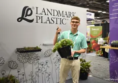 Kevin Wharton of Landmark Plastic with their new 11 inch hanging basket. It is a 1.75 gallon container and has 3 different attachments of the hanger; it can do wire hanger, in the rim and over the rim. It has castle draining and it has a shiny finish. On top of that, is injection molded therefore reusable.”