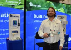 Peter Maher with Bluelab. Holdiong the pulse meter to measure EC and moisture content 