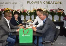 Henrie Brockhoff and Ruud Klasens from Schreurs having a nice conversations with their client from the Limited Liability Company. On the left we have the director, Evgenia Babicheva, and on the right we have Matirny Anatoily wich is the Chief Agronomist at this company.