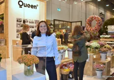 Louise Jepsen of Knud Jepsen next to the Kalanchoe Exotic Orange Meadow, a variety participating in the IPM Essen Novelty award.