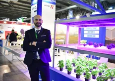 Mattia Battistello of Lucchini next to the LED lights. According to Battistello, the Italian grower is interested in learning about new things, like LED lights and vertical production.