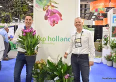 Bert van Slijk and Kees Lagerwerf of KP Holland in the booth of ForemostCo, their broker. According to Lagerwerf, the Curcuma Splash that van Spijk is holding is a hit in Canada and Florida.