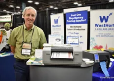 Dave Long with WestHort presenting the Epson GP-C831 printer for retailers or growers selling to retailers. It is an on-demand color printer.