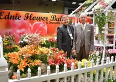 Jeffrey and his father Dick den Breejen presenting their large lily selection, which forms together with the ornamental roof panels the highlight of their booth.