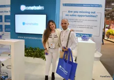 Maria Delgado and George Velez of Komet Sales. According to Velez, Komet Dynamics is a hit; they are bringing artificial intelligence into the flower business.