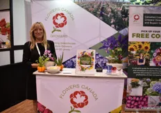 Rachelle Pruss of Flowers Canada promoting Canadian grown flowers and presenting their recently launched Canadian Greenhouse Grower's Directory and Buyer's Guide. They were exhibiting at the show for the first time.
