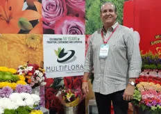 Francisco Morejon proudly standing in front of his multiflora varieties.